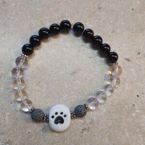 Handmade pawprint lampwork glass bead with black onyx and lave beads for aroma